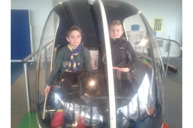 Cubs 'Flying a helicopter' at the Hendon Aircraft Museum - Photographer Vanessa Gregory